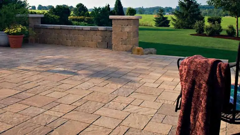 Custom paver patio installation in Carlisle, IA.