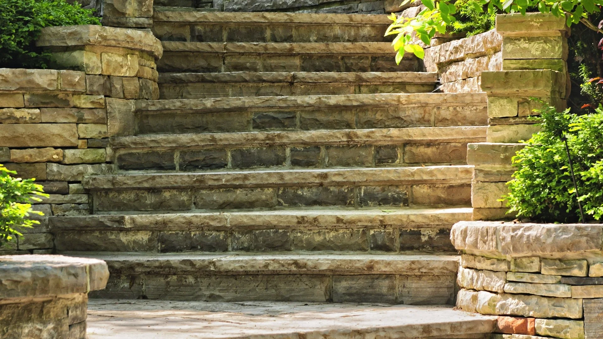 Outdoor steps on hill in backyard in Des Moines, IA.
