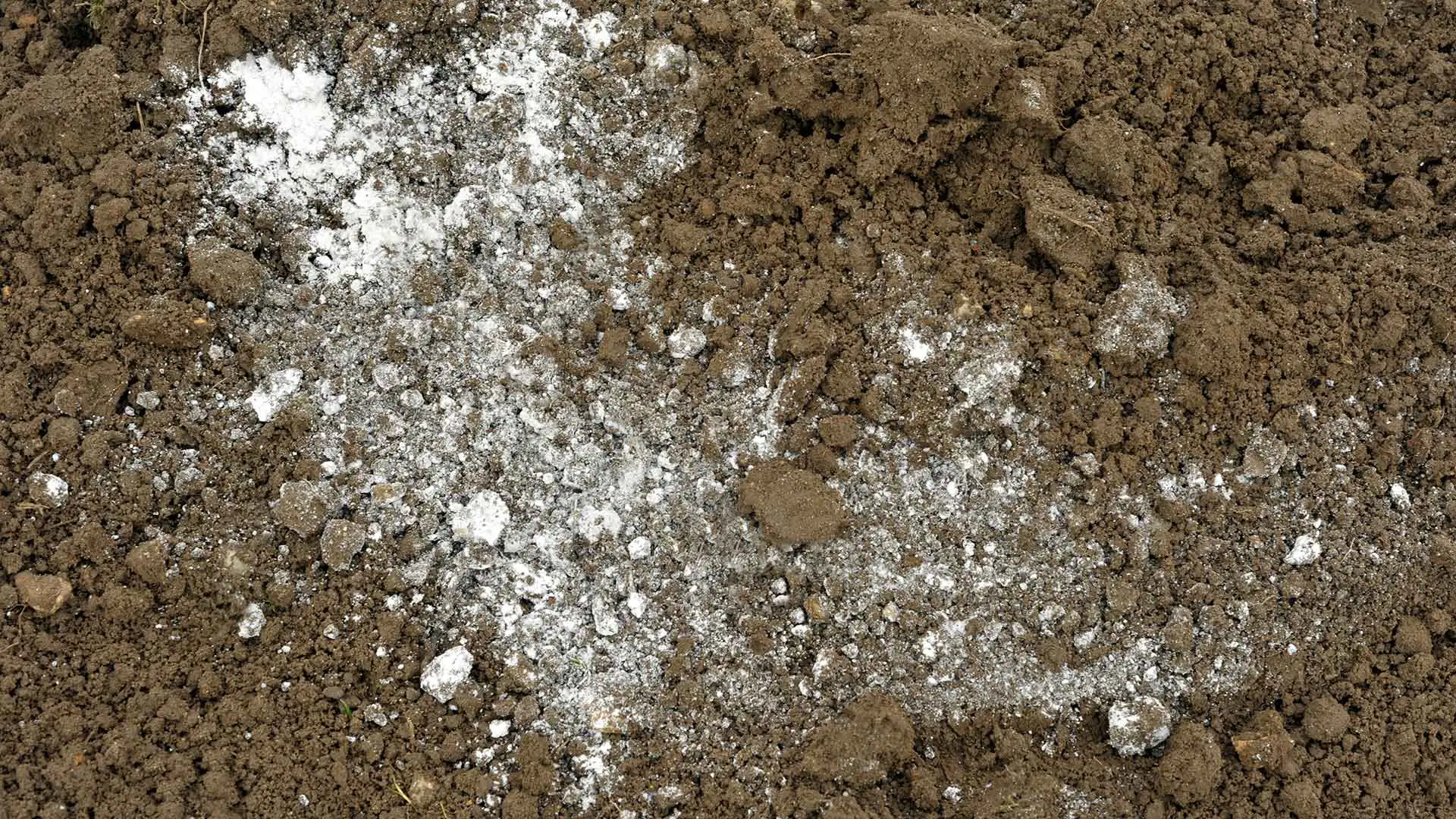 Lime spread upon soil on a property in Carlisle, IA.