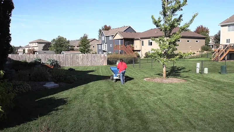 Soil restoration service including top dressing application at a home in Des Moines, IA.