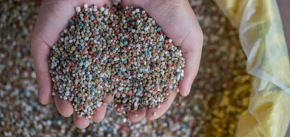 Specially formulated fertilizer that will be used for a Des Moines lawn.