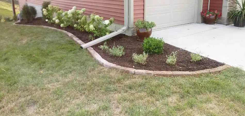 Weeds in the landscape bed of this Des Moines property have been eradicated.