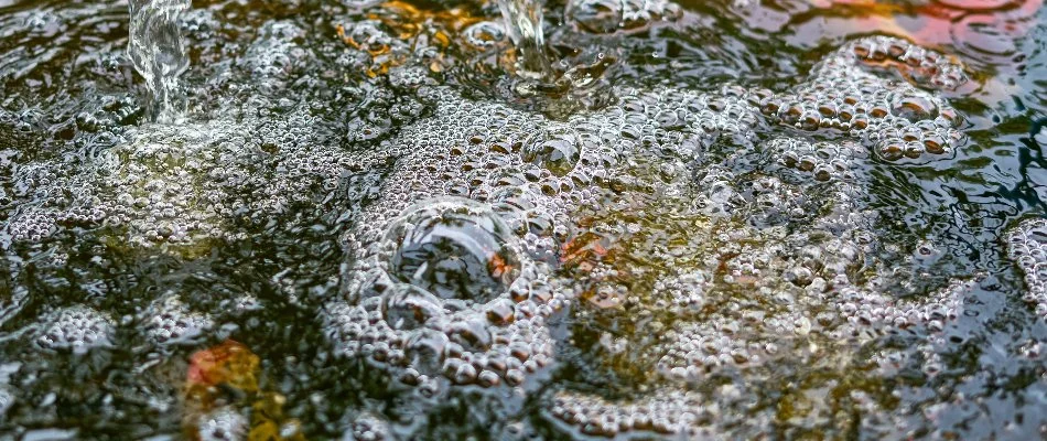 Aerated pond water with bubbles in Des Moines, IA.