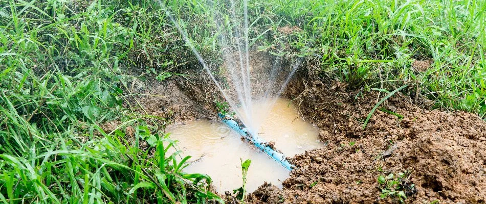 Damaged pipe on an irrigation system and a water puddle in Slater, IA.